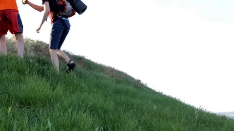 Rock climbing helping hand Stock Footage