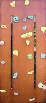 Rock climbing wall with colorful knobs Stock-Fotos