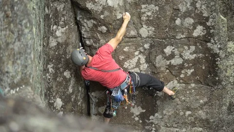 Rock Climbing Wall With Ropes and Harness Stock Footage 121389595
