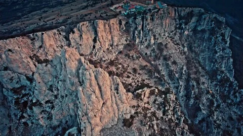 Rock coast at sunset Stock Footage 83548606