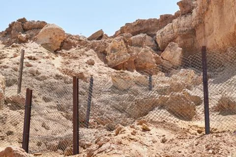 Rock collapse on beach. Collapsed rock, blocked on visiting the beach by tour Stock Photos