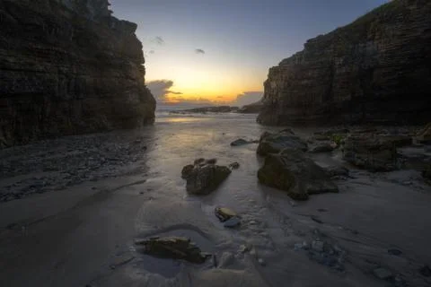 Rock corridors between sea cliffs Stock Photos