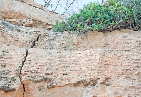 Rock with crack Stock Photos