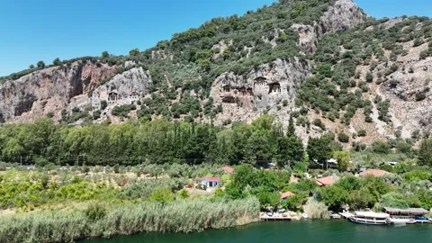 Rock-cut temple tombs in Ancient city of Kaunos, Dalyan valley Stock Footage 336343939