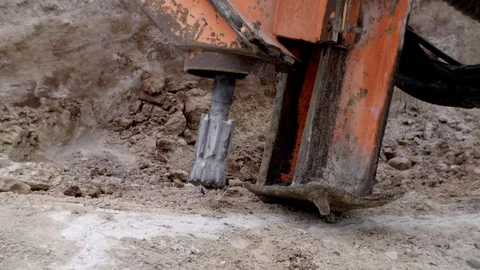 Rock driller start drilling the ground close up slowmo Stock-Footage 69979469