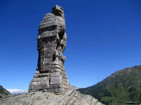 The rock eagle on the top of the Alps Stock Photos