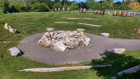 Rock Fire Pit On Grass Hill 스톡 사진