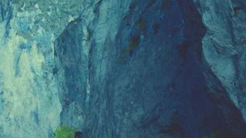 Rock formation in a canyon with sunlight hitting the surface Stock Footage 345058845