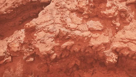 Rock formation in desert area with red soil and uneven texture Stock Footage 343522741