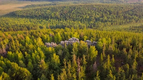 Rock formation in the forest on the hill. Ural mountains. Stock Footage 120398057