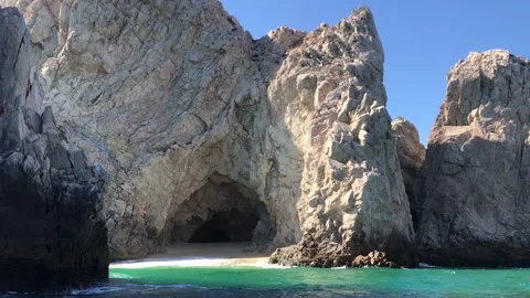 Rock Formation with Sea Cave and Turquoise Water Along the Mexican Coast 動画素材 345101497