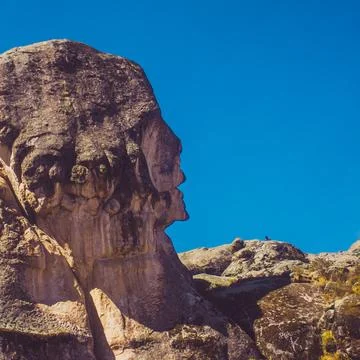 Rock formation in the shape of a human face Foto stock