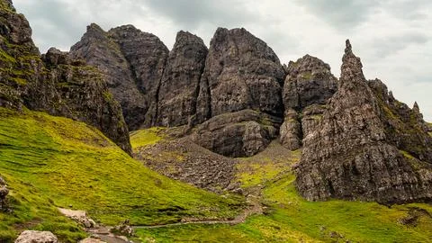 Rock formation of the so-called Old Man of Storr seen from below and with a path 스톡 사진