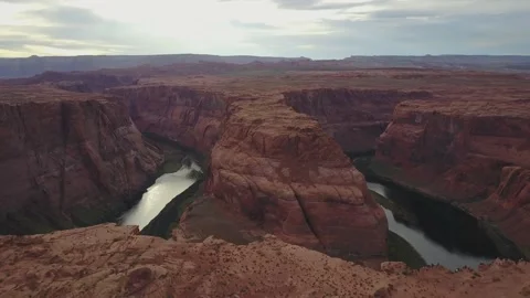 Rock formation in Utah with water surrounding it in a desert from drone Stockbeeldmateriaal 167659138