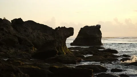 ROCK FORMATION WITH WAVES BREAKING OVER THEM Stock Footage 221300897