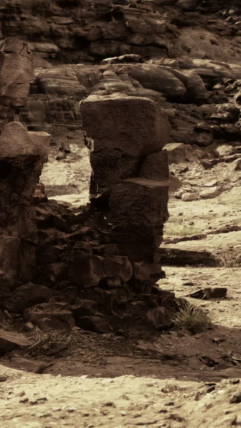 Rock formations and earth texture in a dry landscape at midday Stock Footage 332205780