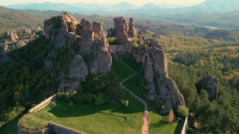 Rock formations and walls of a medieval fortress in Belogradchik, northwest Bulg Видео 230434331