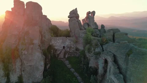 rock formations and walls of a medieval... | Stock Video | Pond5