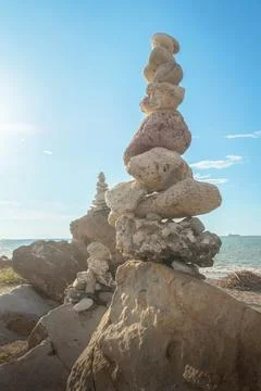 Rock formations on the beach at sunset Foto stock