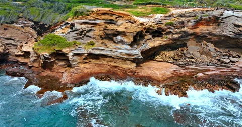 Rock formations broken with water in some places Stock Footage 308641146
