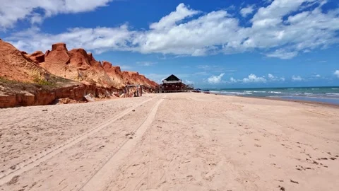 The rock formations at Canoa Quebrada Beach at Canoa Quebrada, Brazil Stock Footage 308515730