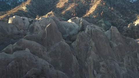 Rock formations at Devil's Punchbowl in golden hour light, creating Stock Footage 279153256