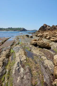 Rock formations in front of cliffs in northern Spain Stock Photos