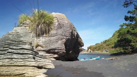 Rock formations know as the Pancake Rocks at the town of Raglan,New Zealand Stock Footage 142272711