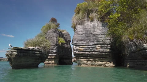 Rock formations know as the Pancake Rocks at the town of Raglan,New Zealand Stock Footage 142281817