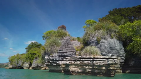 Rock formations know as the Pancake Rocks at the town of Raglan,New Zealand Stock Footage 142284000