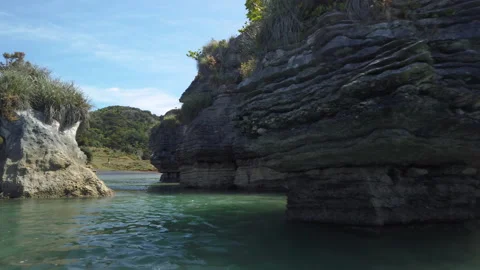 Rock formations know as the Pancake Rocks at the town of Raglan,New Zealand Stock Footage 142288019
