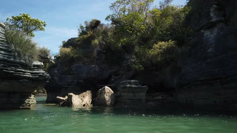 Rock formations know as the Pancake Rocks at the town of Raglan,New Zealand Stock Footage 142290223