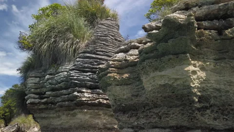 Rock formations know as the Pancake Rocks at the town of Raglan,New Zealand Stock Footage 142292132