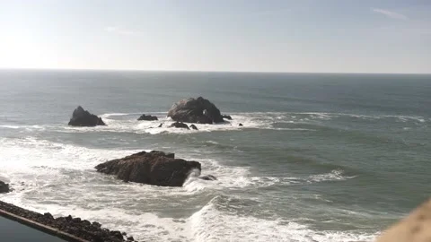 Rock Formations in Ocean With Large Waves, Gimbal Reveal Shot Stock Footage 145463194