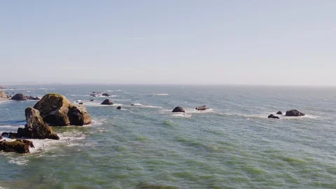 Rock formations in the sea at Bodega bay Stock Footage 92010684
