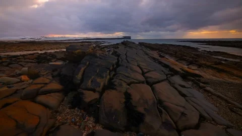 Rock formations time lapse during sunset in Birsay Orkney in 4K Stock Footage 297281256