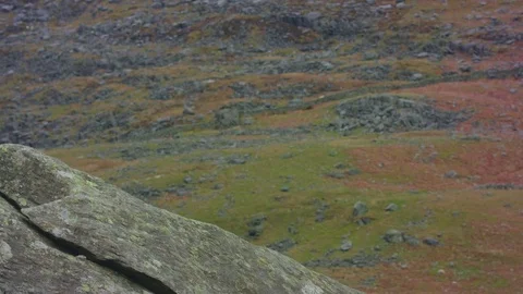 Rock in front of Hill Stock Footage 75566733