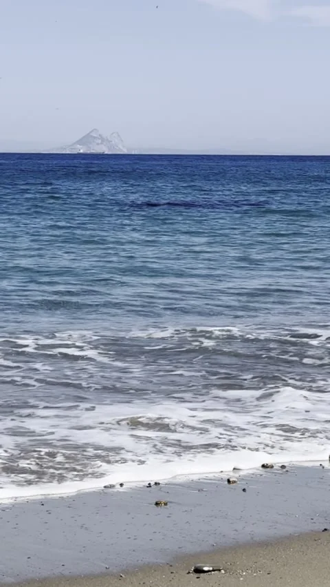 Rock of Gibraltar view from Playa de San Amaro in Ceuta Spain Stock Footage 311643953