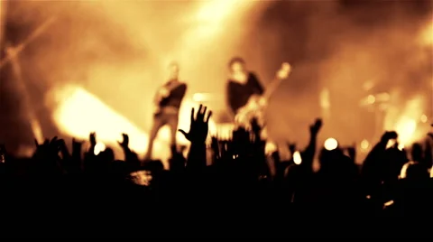Rock guitarist band on open air live music show cheering crowd in illumination Stock Footage