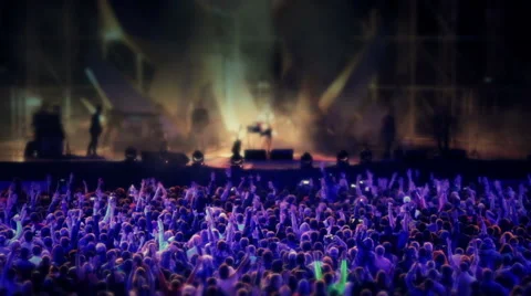 Rock heavy metal band on open air live music show cheering crowd in illumination Stock Footage