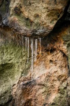 A rock with ice on it Stock Photos