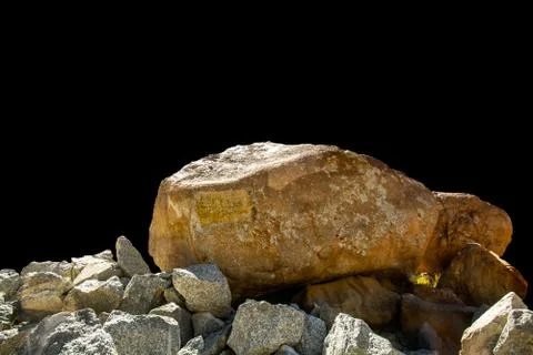 Rock isolated on black background. Stock Photos