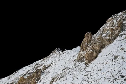 Rock isolated on black background. Stock Photos