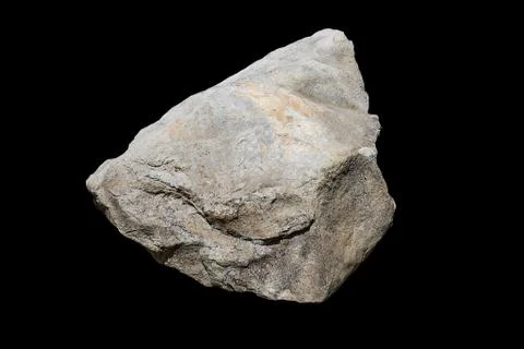 Rock isolated on black background. Stock Photos