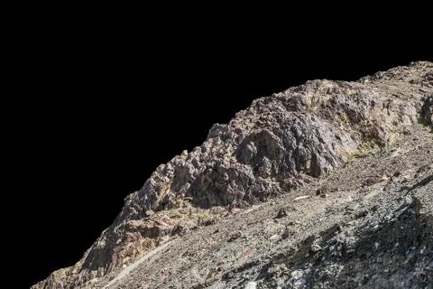 Rock isolated on black background. Stock Photos