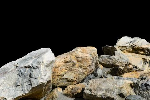 Rock isolated on black background. Stock Photos