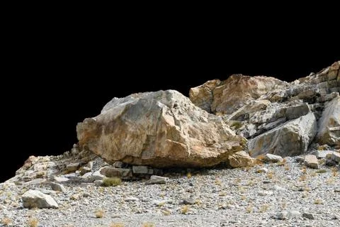 Rock isolated on black background. Stock Photos