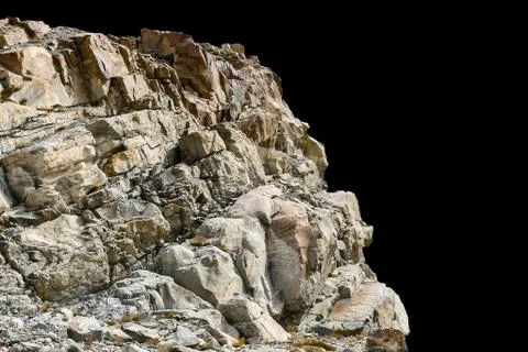 Rock isolated on black background. Stock Photos