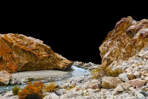 Rock isolated on black background. Stock Photos