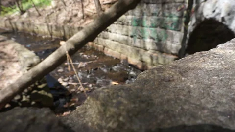 ROCK LEDGE OVER CREEK Stock Footage 194453407